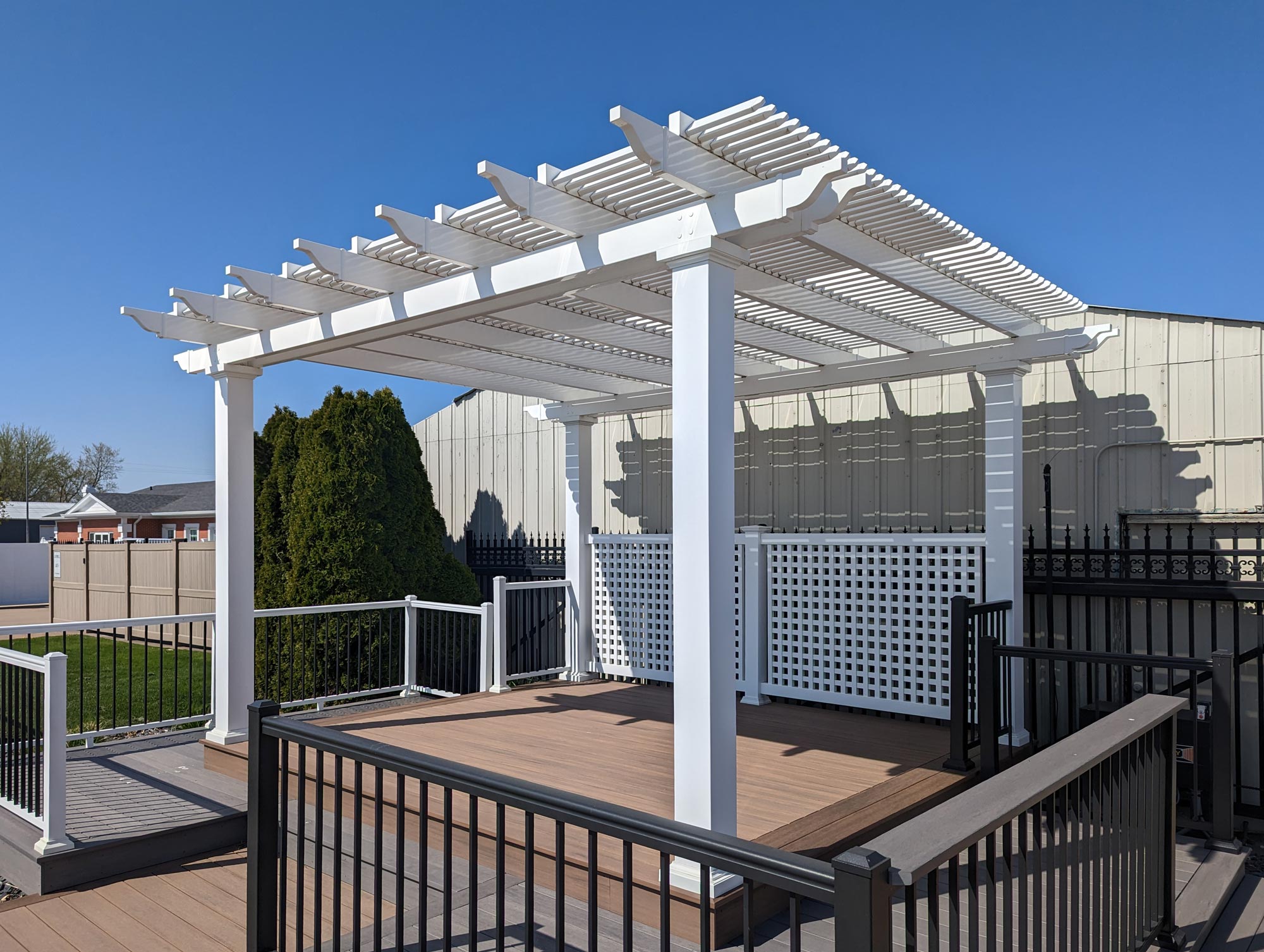 White Traditional Pergola free standing at showroom location